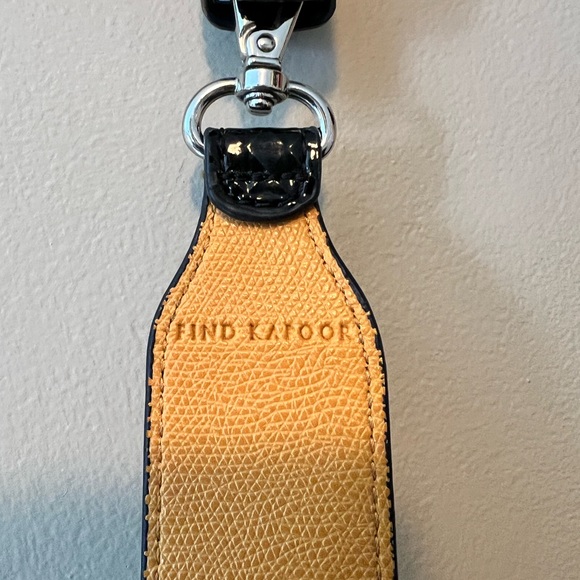 Purse straps. One is 42” long and leopard print, other faux patent leather 32”. - Picture 6 of 8